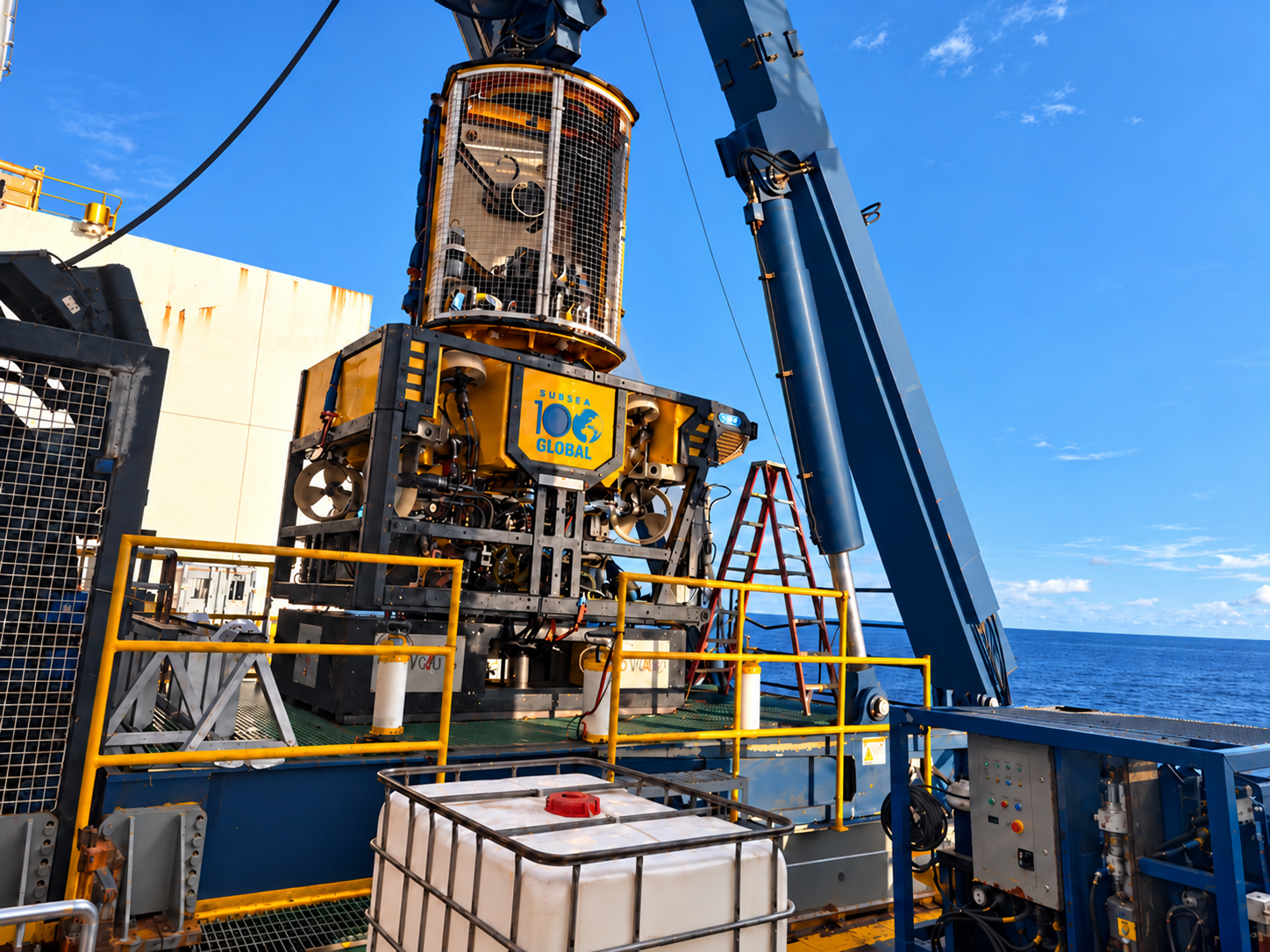 Technician servicing a work-class ROV on deck